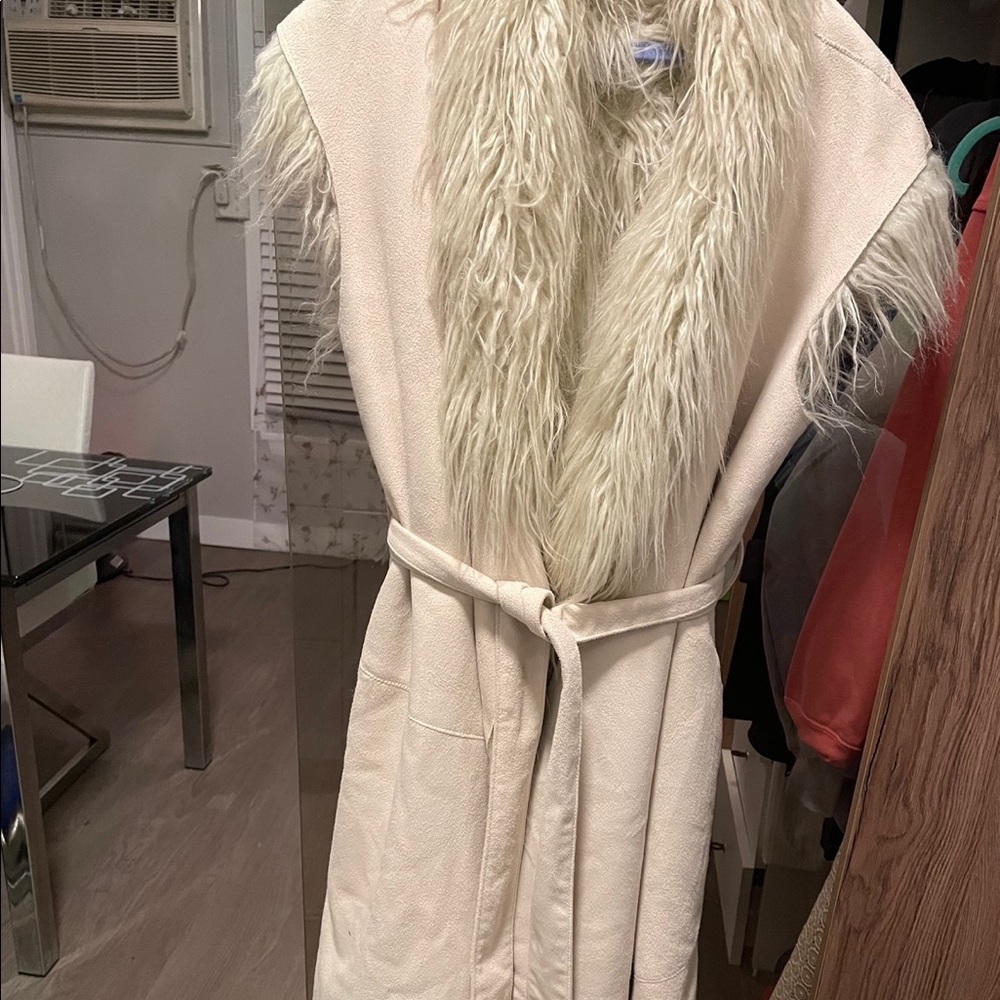 reversible down jacket, sleeveless.